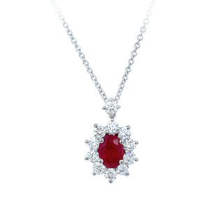 Oval ruby halo pendant