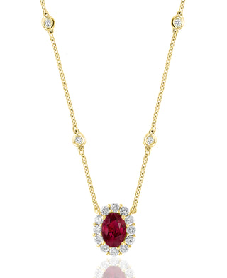 Ruby Oval And Diamond Halo Pendant